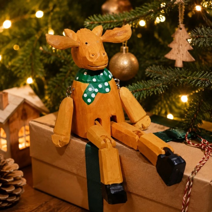Handgeschnitzte Tierfiguren aus Holz mit baumelnden Beinen HL4129