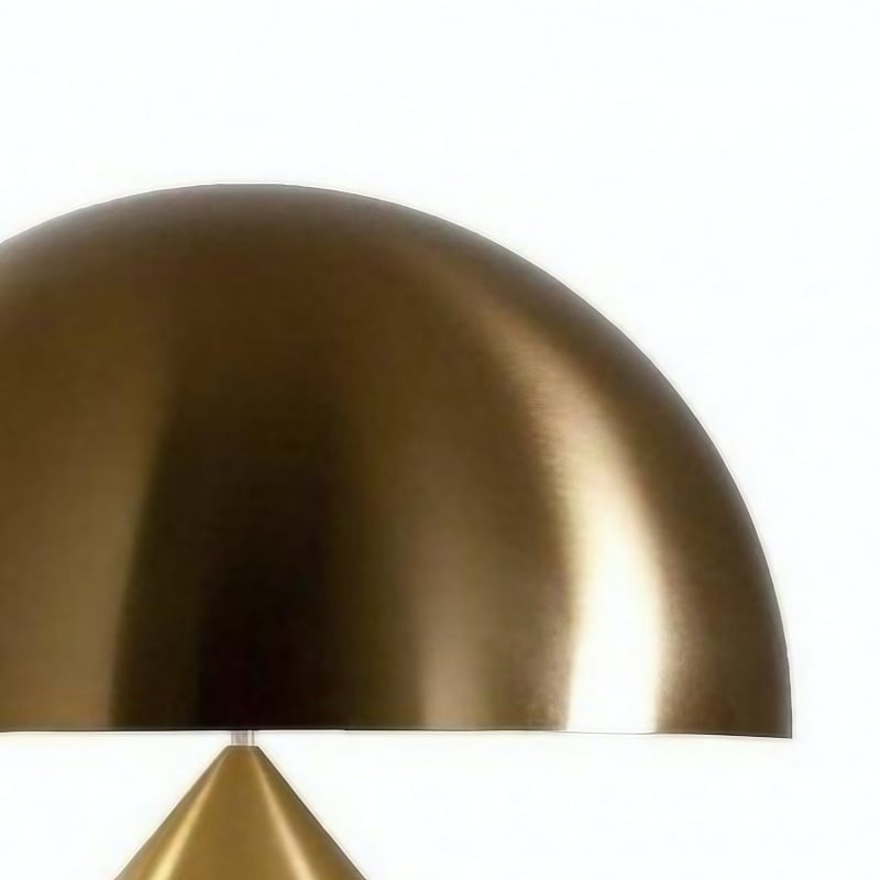 Close view of the gold dome shade and pointed centre