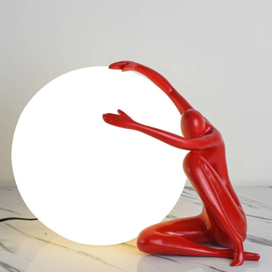 Humanoïde bal vasthoudende tafellamp HL339