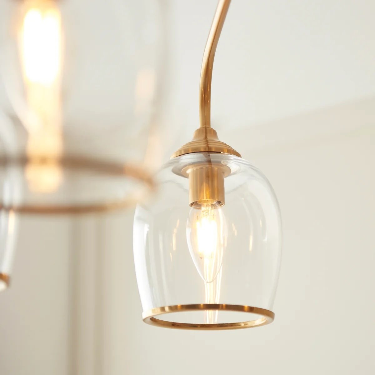 Brazara hanglamp met meerdere lichtpunten en glazen kap - gebogen metalen armen voor moderne woningen HL2079
