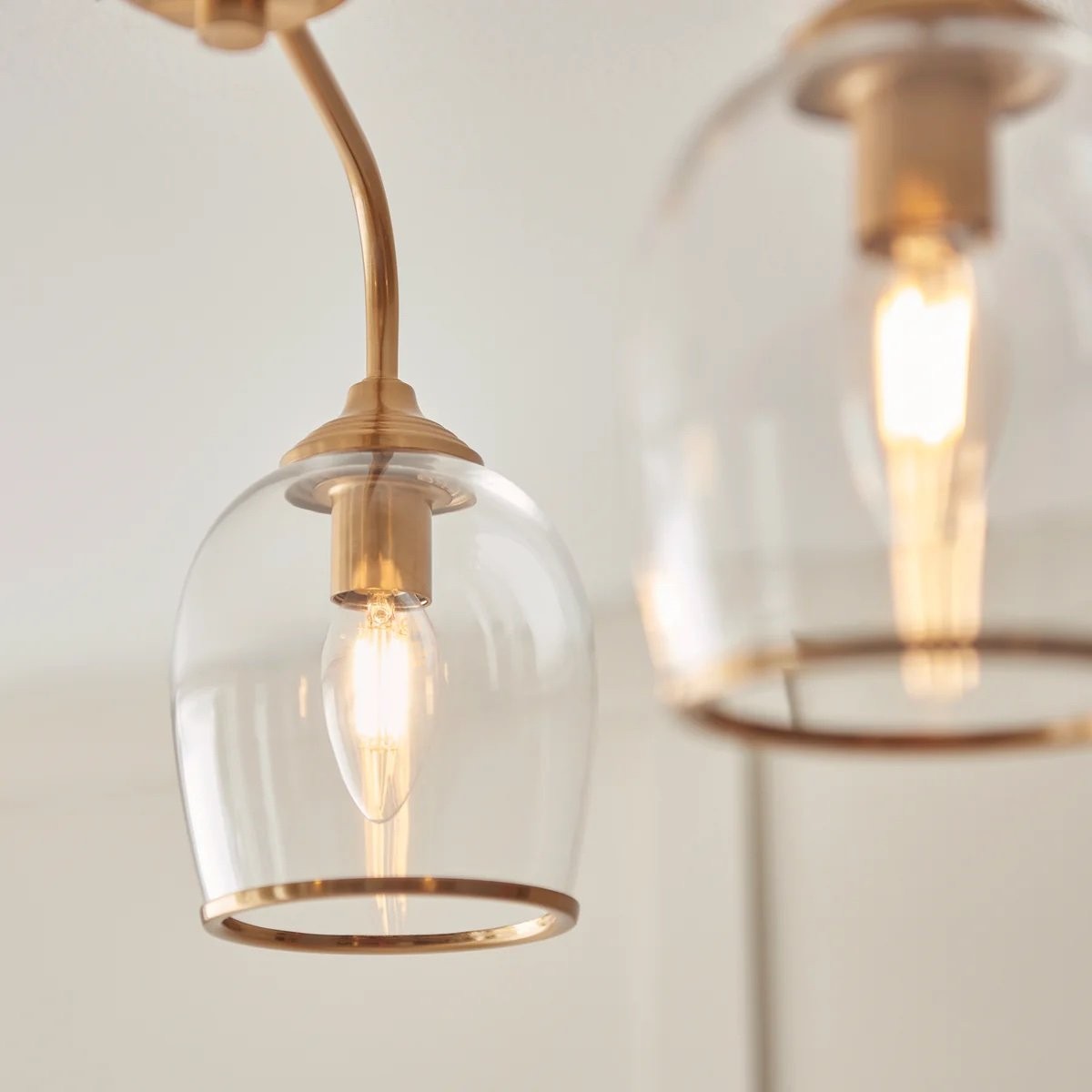 Brazara hanglamp met meerdere lichtpunten en glazen kap - gebogen metalen armen voor moderne woningen HL2079