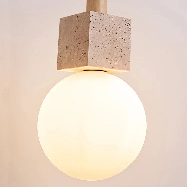 Moderne hanglamp in de vorm van een travertinkubus HL3481