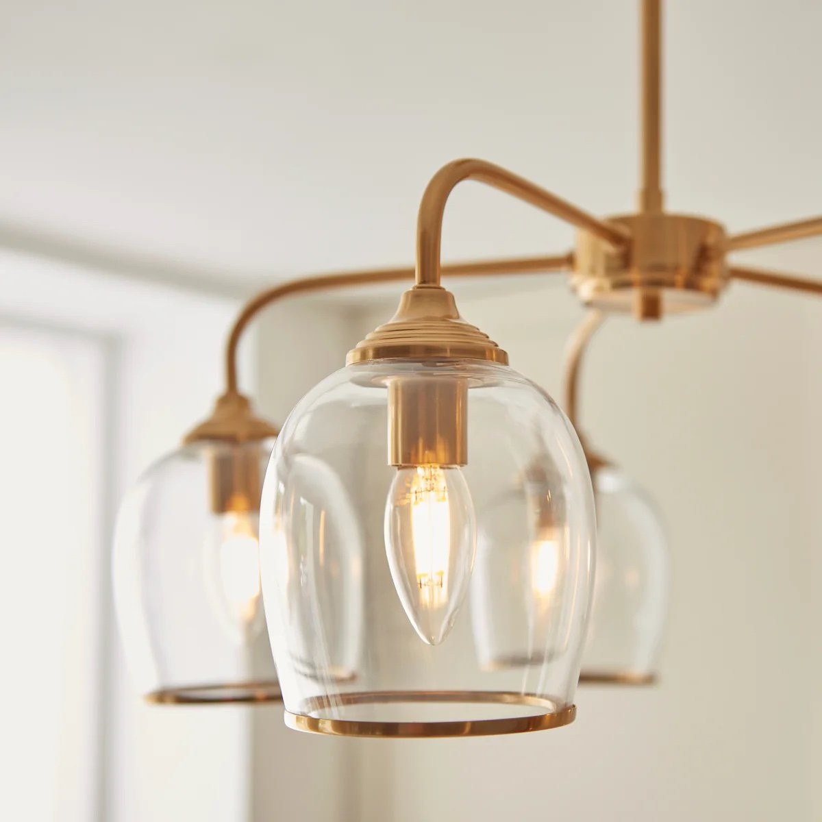 Brazara hanglamp met meerdere lichtpunten en glazen kap - gebogen metalen armen voor moderne woningen HL2079
