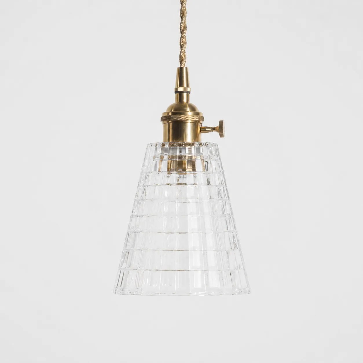 Style E textured glass shade with antique brass E27 socket, front view