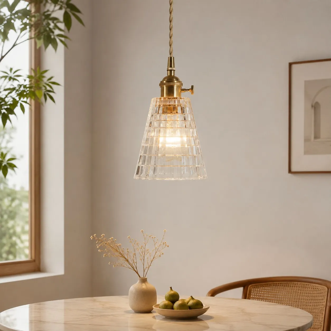 Style E geometric glass pendant above a wooden dining table