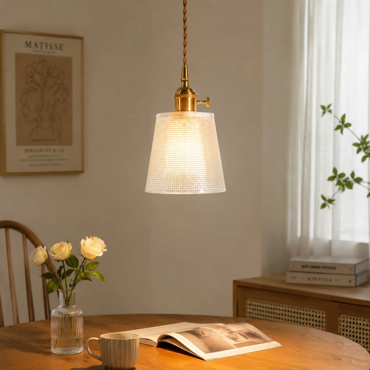 Style B fine-ribbed glass pendant above a quiet reading corner