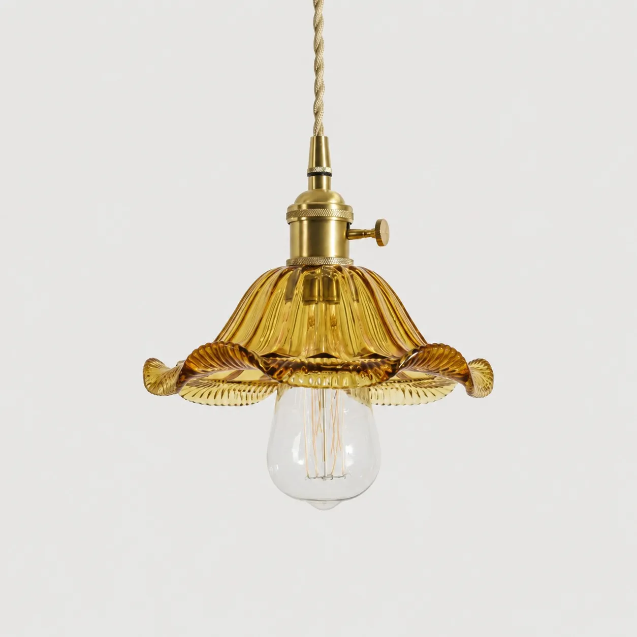 Style L - Amber textured glass shade with antique brass E27 socket, front view