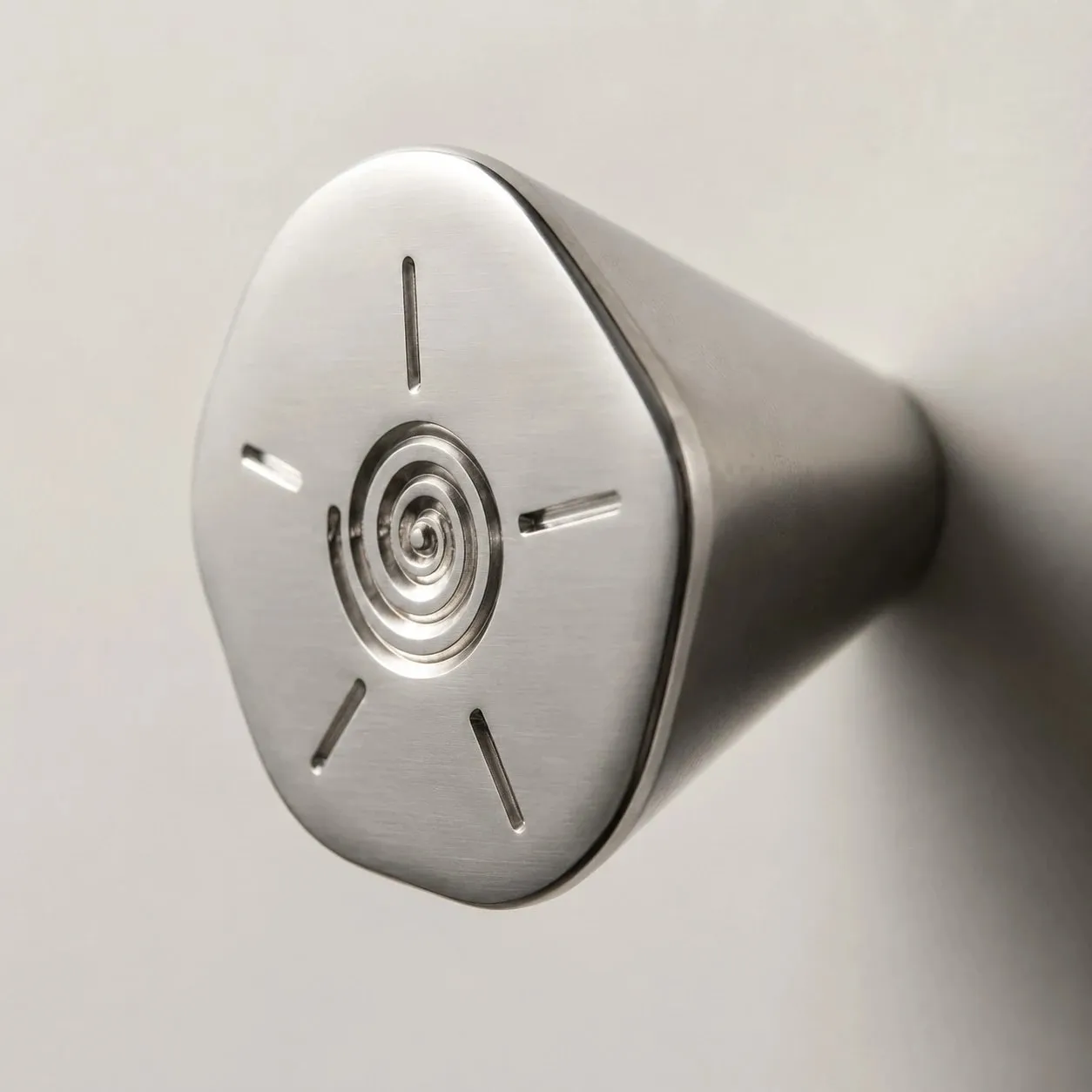 Tapered side profile of titanium silver cabinet knob